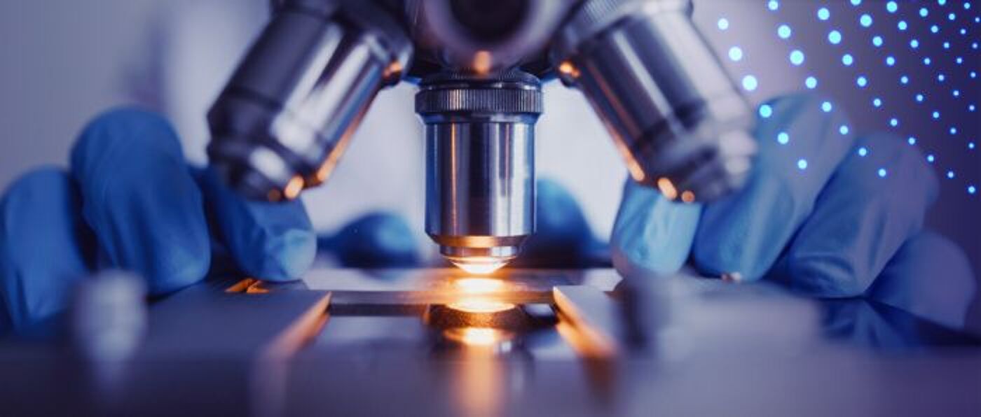 Close up of a section of a lab microscope