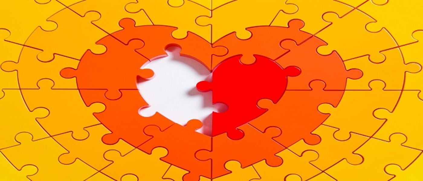 Jigsaw puzzle in the shape of a heart