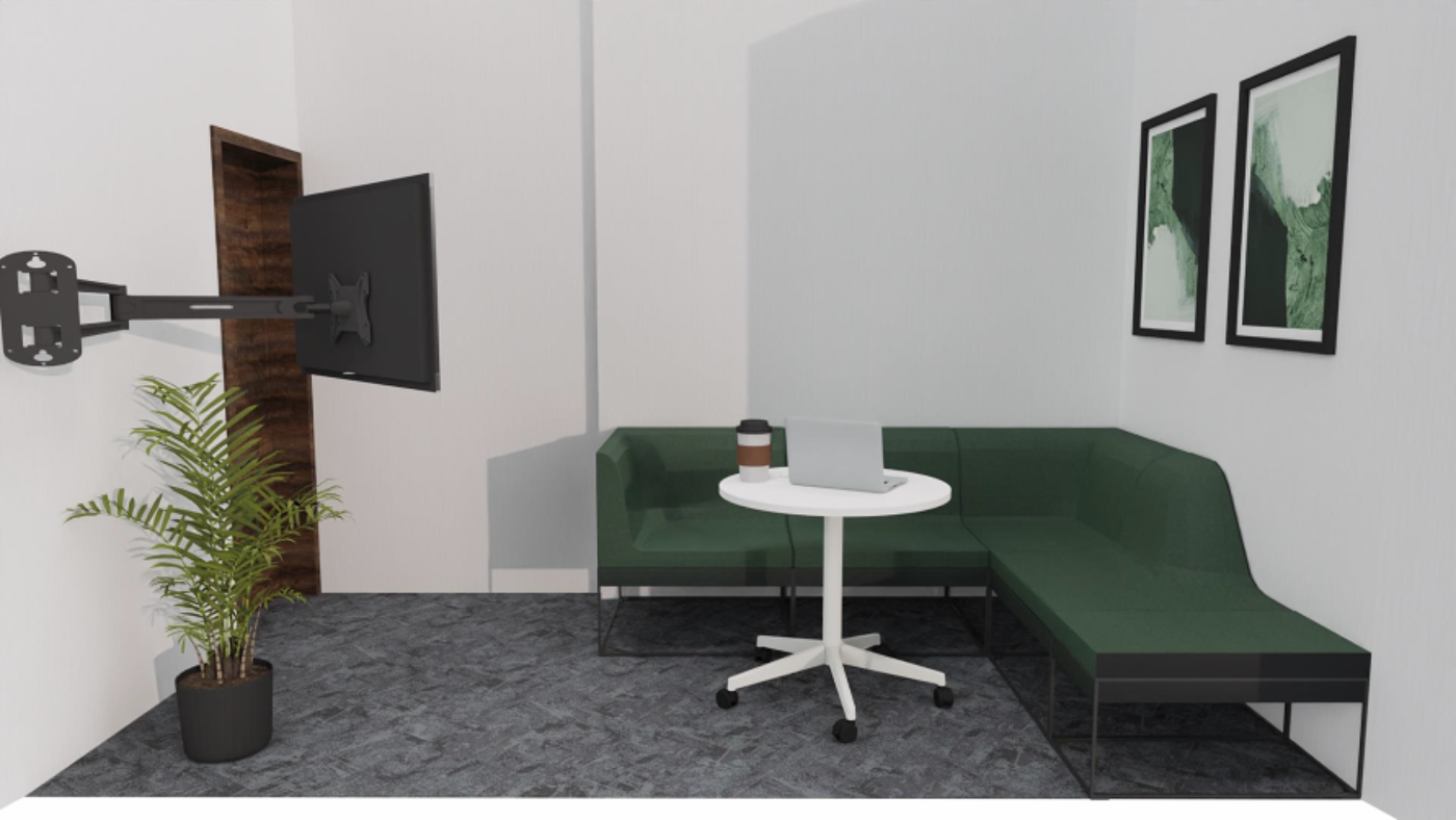 Room with corner sofa to the top right, small movable table on castors with laptop, screen on wall