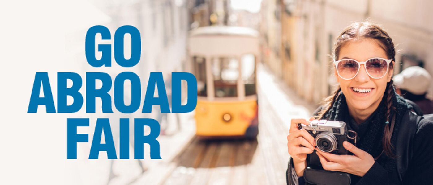 Go Abroad Fair 2022, student infront of tram