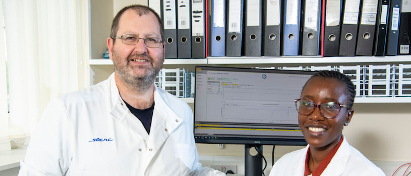 Dr Douglas Morrison, SUERC, and Ms Kanekwa Zyambo, University of Zambia, on-site at SUERC, East Kilbride.