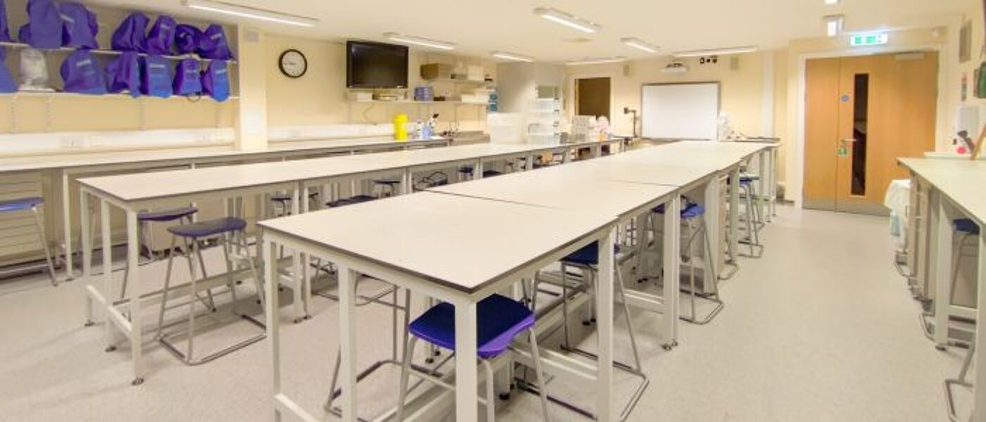 Slack building classroom showing lab facilities, table and chairs