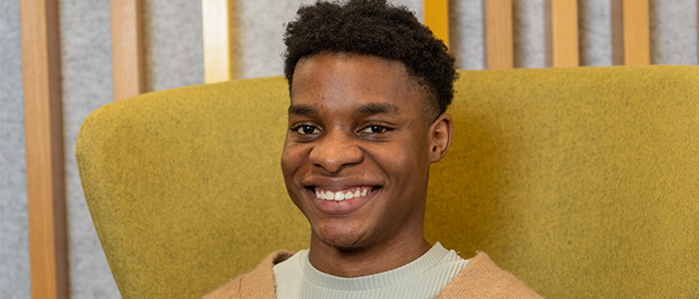 Image of Ryan sitting on a chair